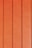 Four vertically aligned wooden planks with a rich brown color. Each plank has evenly spaced grooves running lengthwise, providing a textured appearance. Subtle variations in shade and grain are visible across the surface.