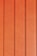 Four vertically aligned wooden planks with a rich brown color. Each plank has evenly spaced grooves running lengthwise, providing a textured appearance. Subtle variations in shade and grain are visible across the surface.