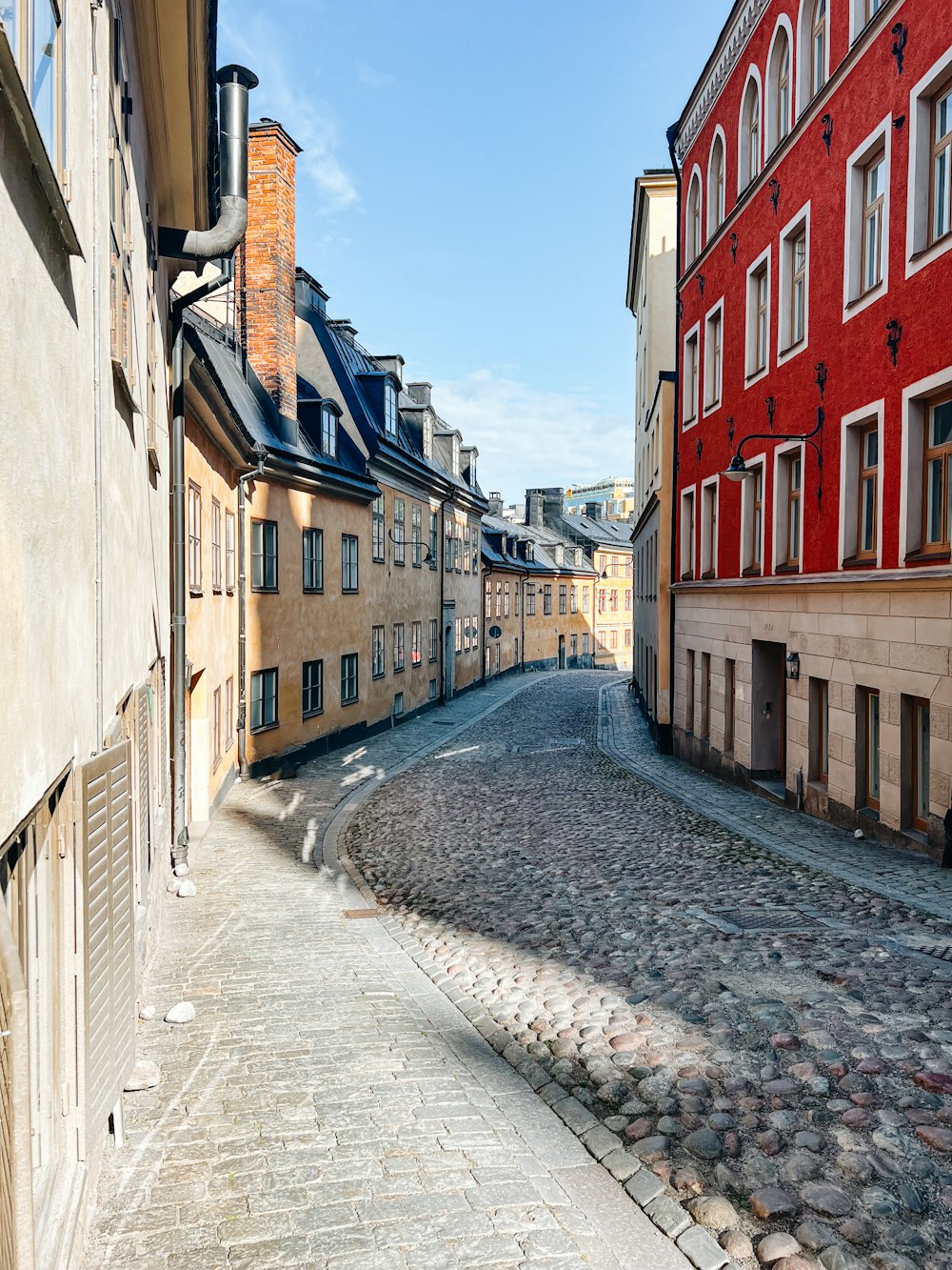 a cobblestone street in a european city