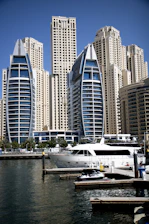 The exterior view of MarinaVault's warehouse located near Princess Tower in Dubai Marina under clear skies.