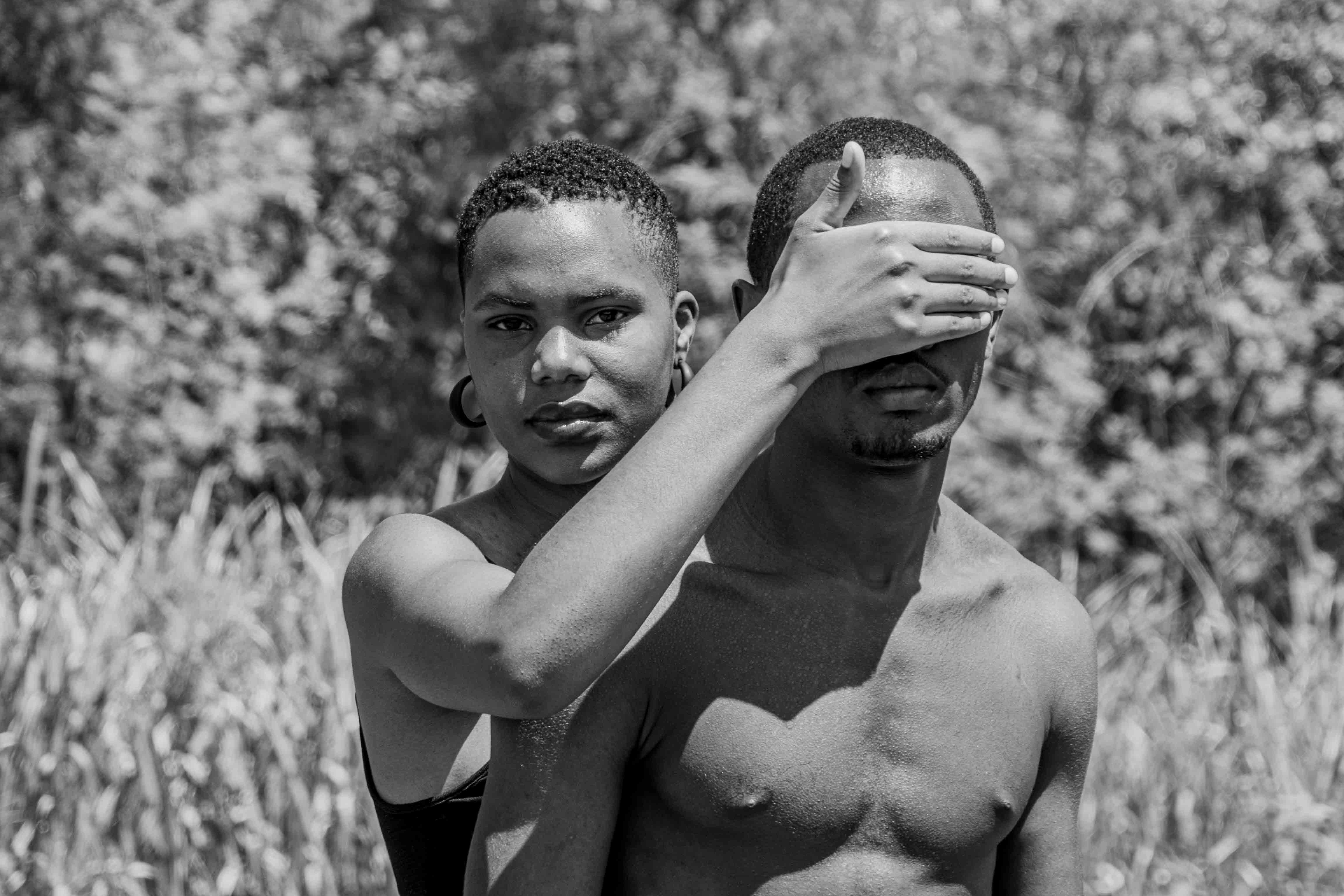 a black and white photo of a man and a woman