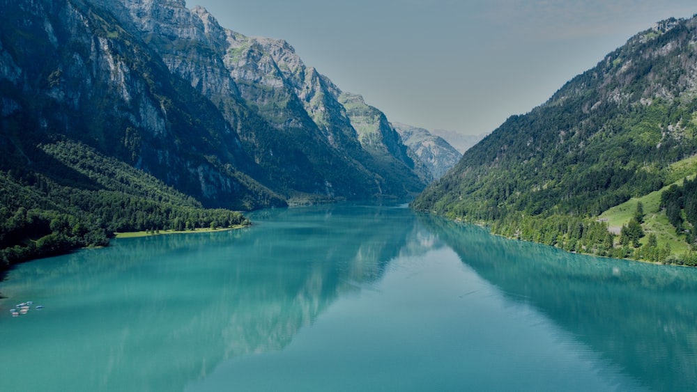 a large body of water surrounded by mountains