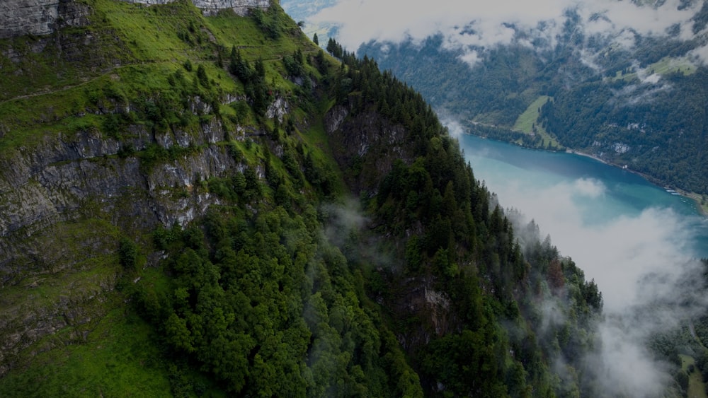 a scenic view of a body of water surrounded by mountains