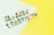 Colorful and transparent 3D letters spelling out 'Unknown Creativity' lay on a minimalistic, pastel-colored background that is divided into light green and yellow sections.