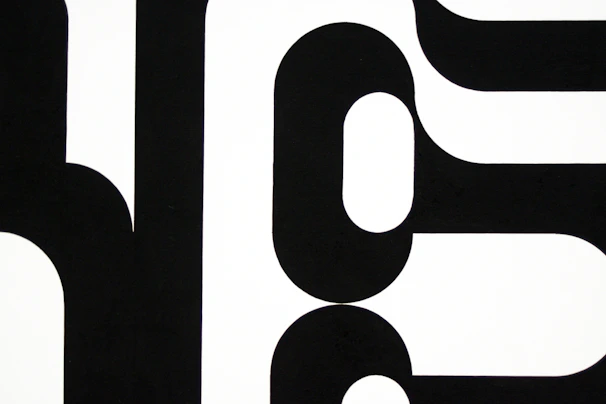 Limited edition t-shirt with a striking geometric design in contrasting black and white.