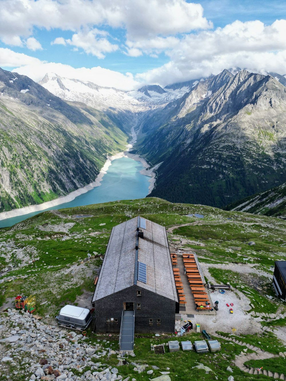 an aerial view of a building in the mountains