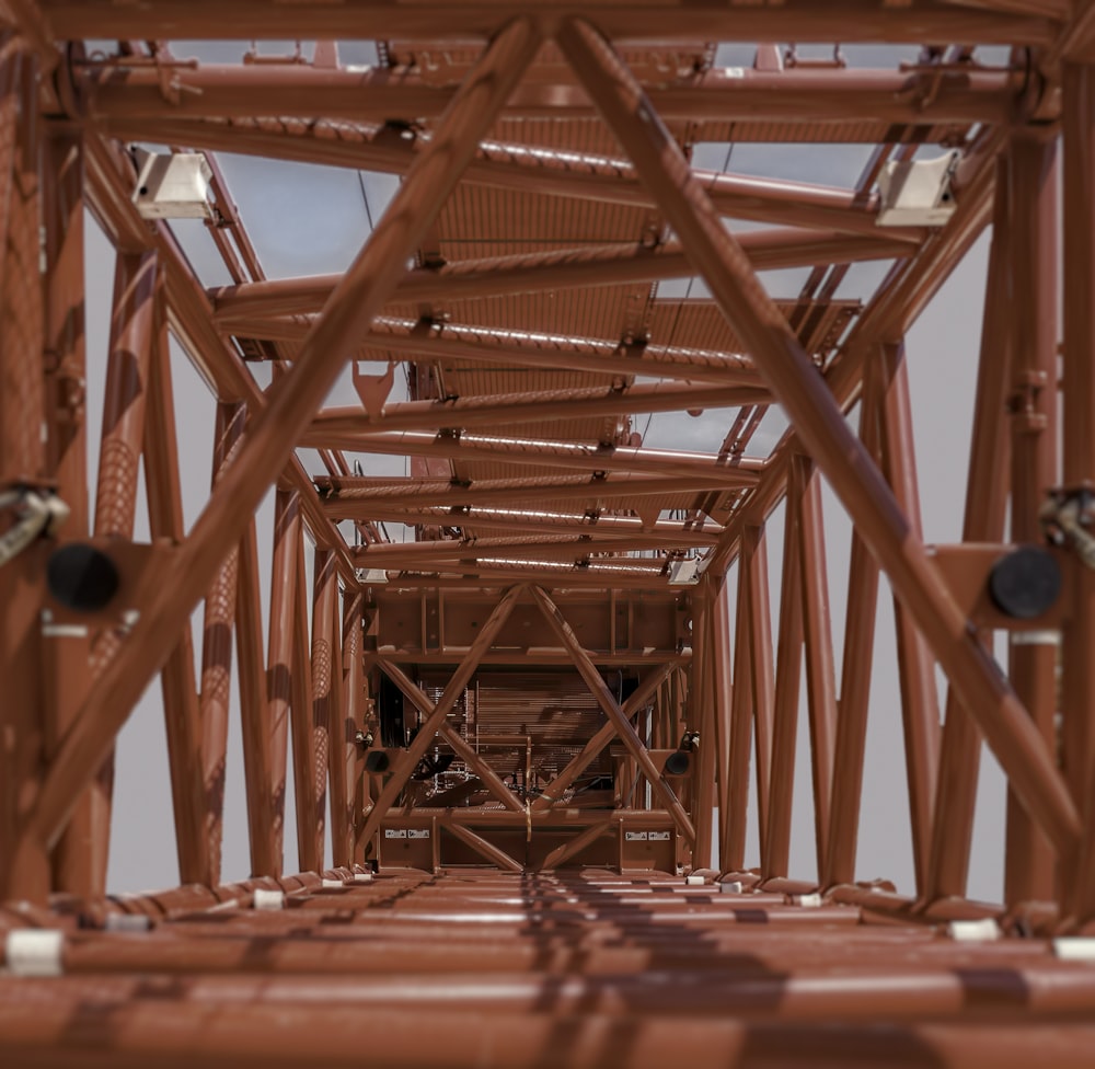 a red metal structure with a sky background