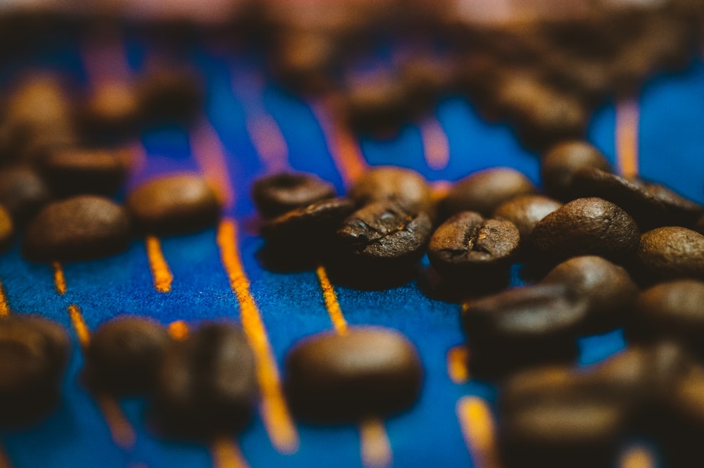 a close up of coffee beans on a table