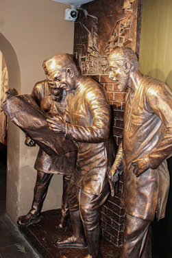 Photo of Blue Blaze Limited team discussing commodity trade over a map of Asia.