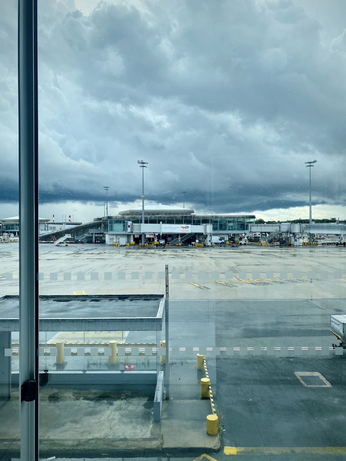 Dark storm clouds gathering over an airport runway