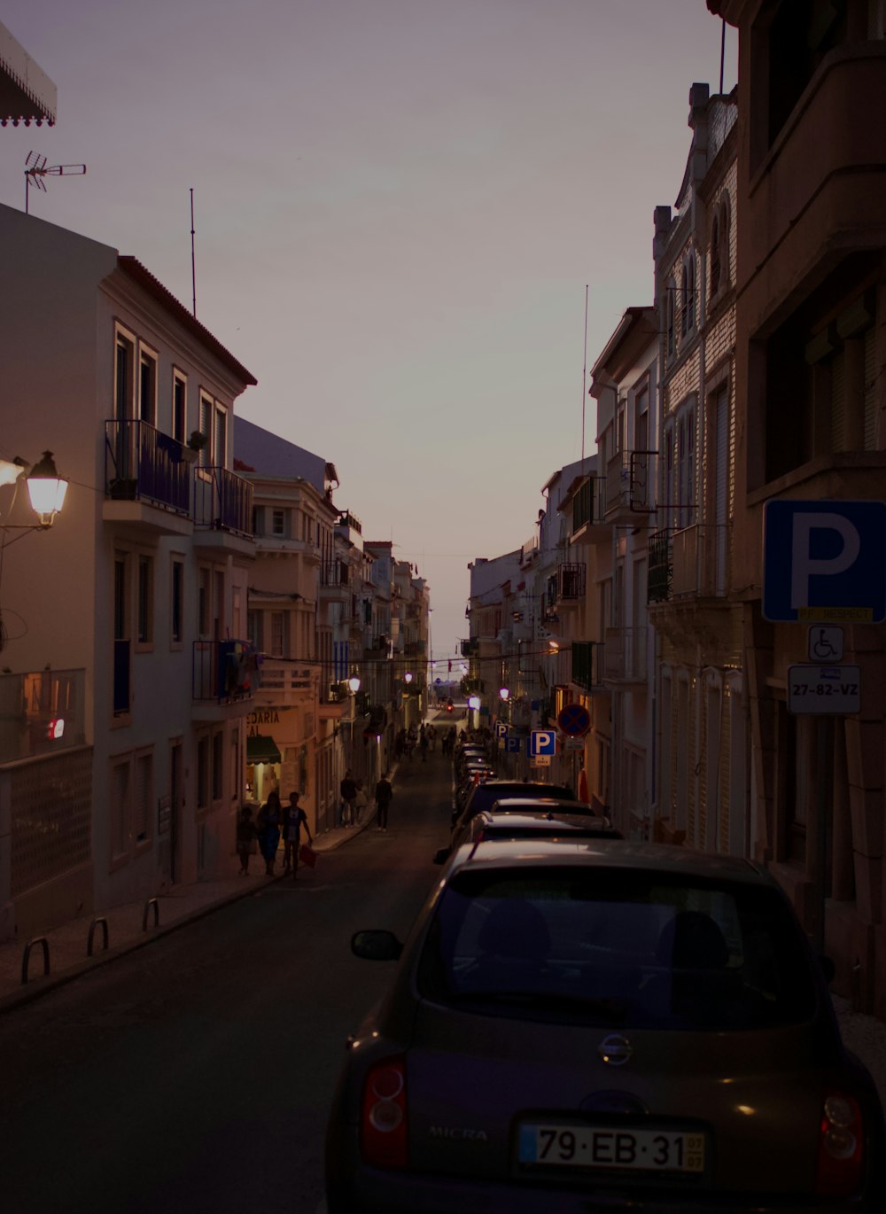 a car parked on the side of a street