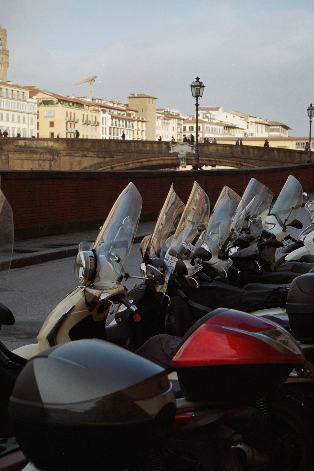 a row of motorcycles parked next to each other