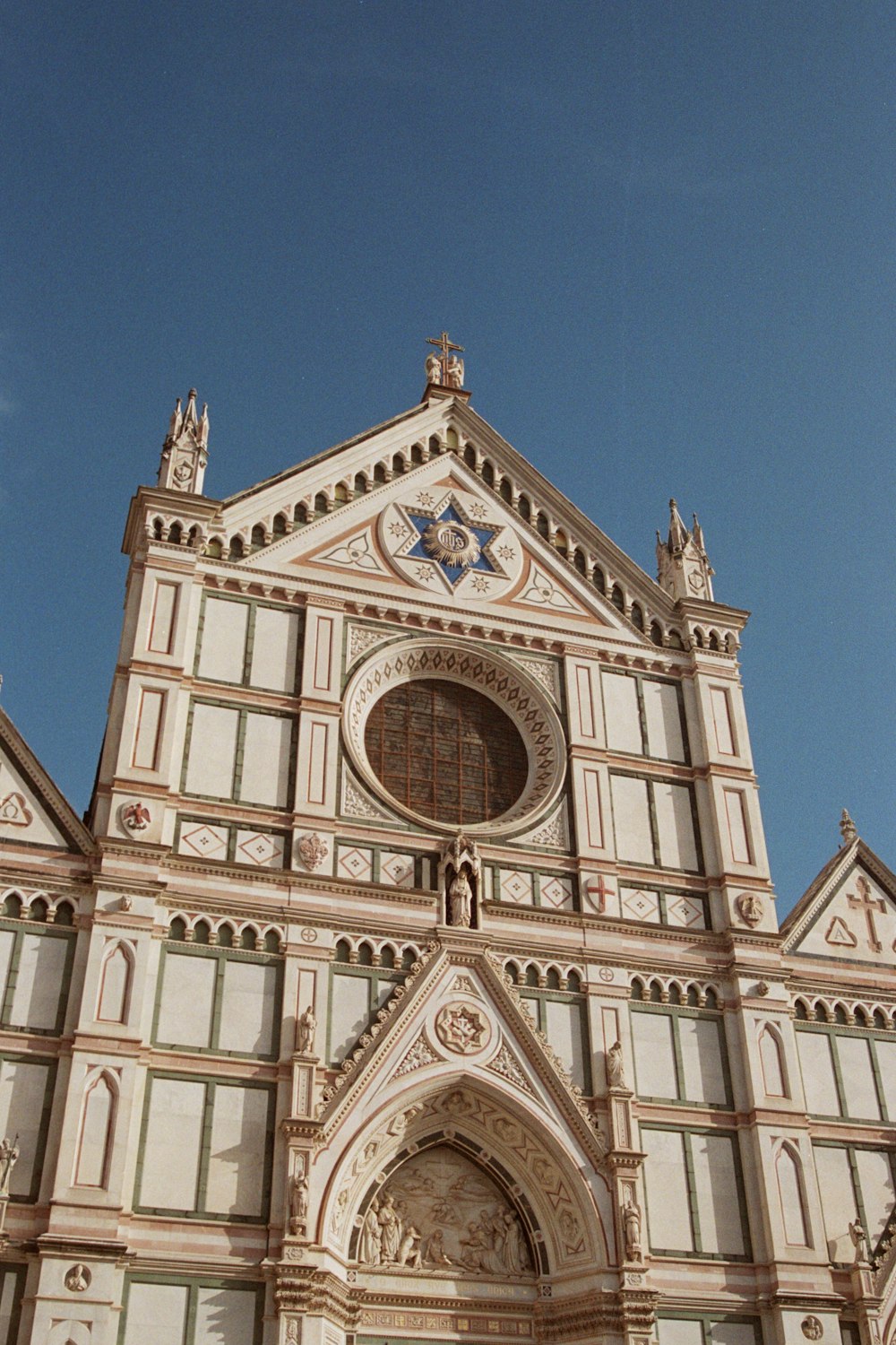 a very tall building with a clock on it's side