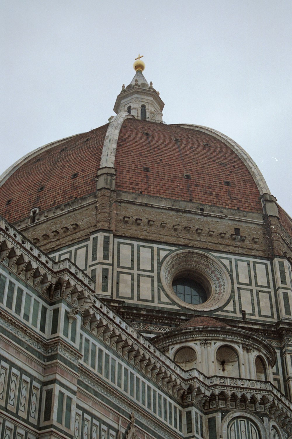 a large building with a clock on the top of it