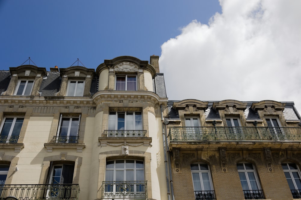 a tall building with balconies and balconies on top of it