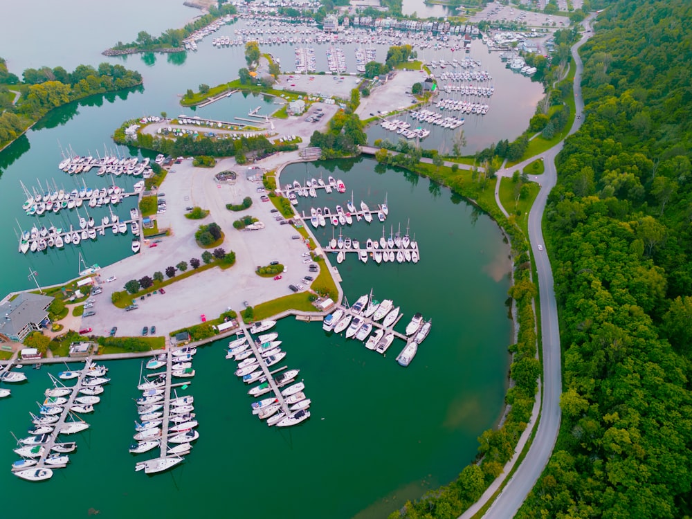 an aerial view of a marina with many boats