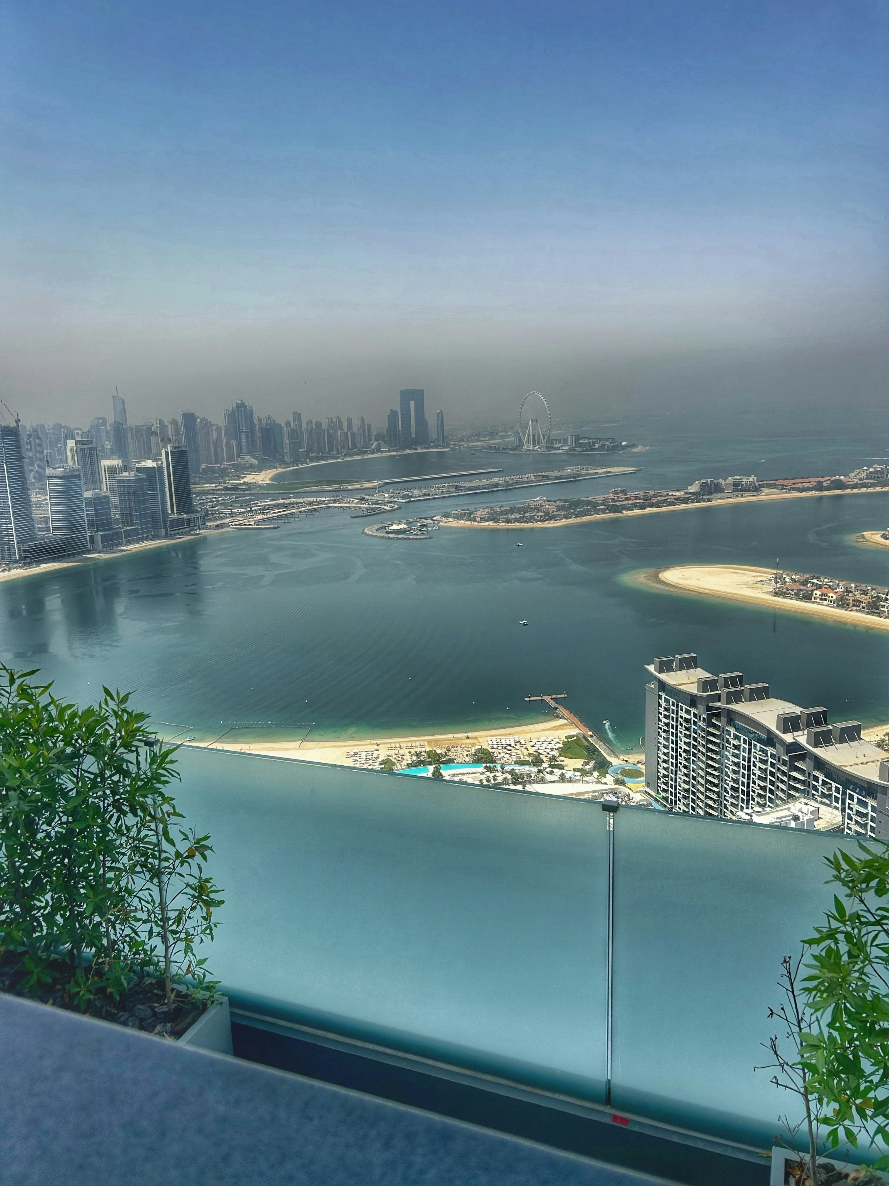 Luxury high-rise residential tower on Palm Jumeirah island with Arabian Gulf sea views