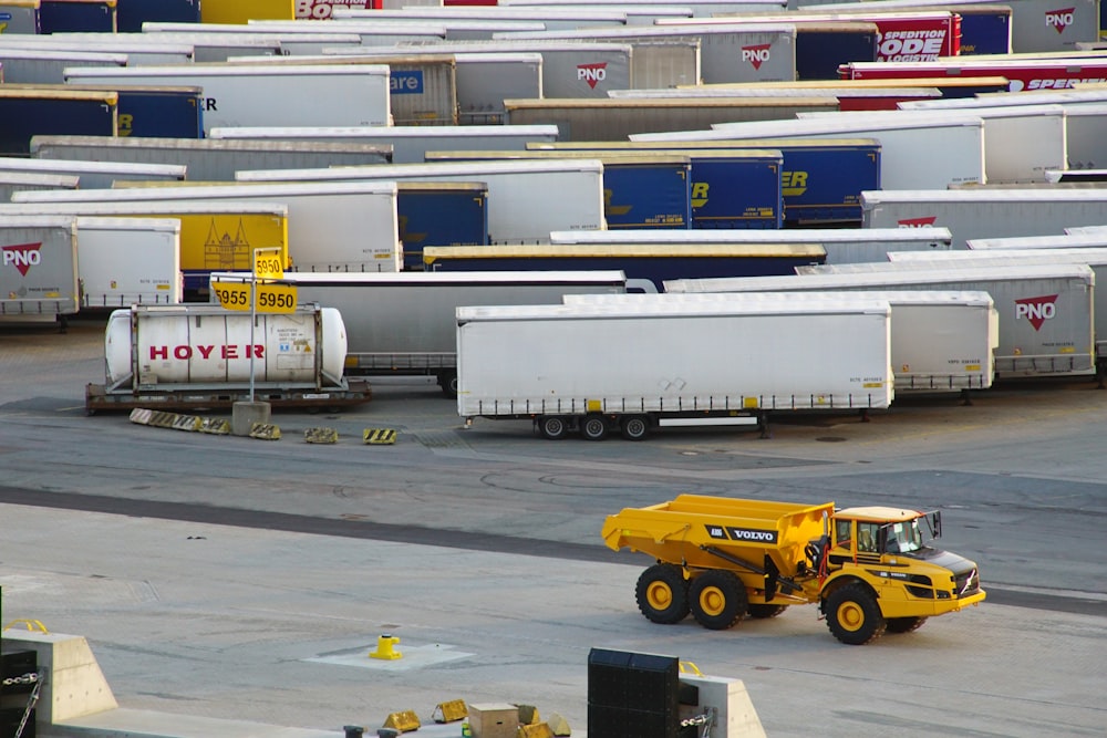 a large group of trucks parked next to each other