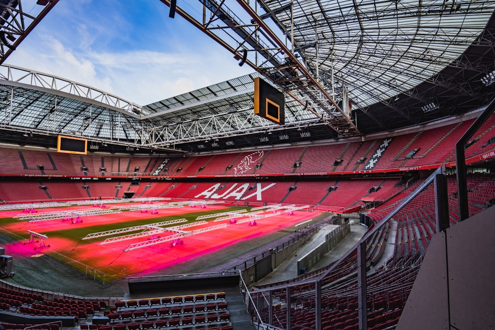 a stadium filled with lots of red seats