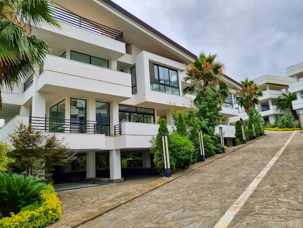 Exterior view of nuchem biopharma's modern facility building in India on a sunny day.