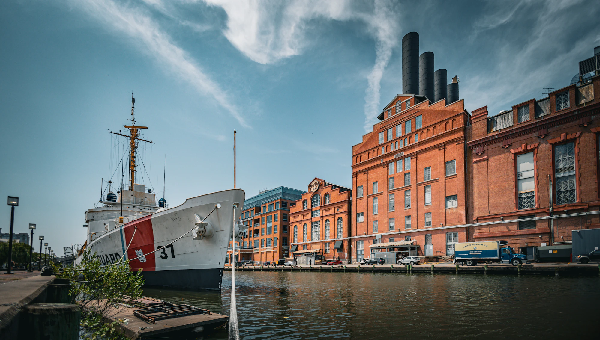A vessel moored beside a building on the Baltimore waterfront