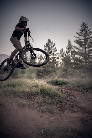 A thrilling downhill mountain biking action shot.