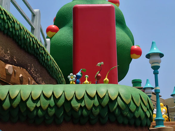 A vibrant scene showing a character interacting with colorful musical notes floating in a whimsical landscape.