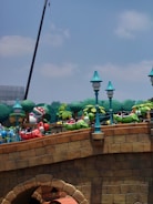 A whimsical scene of animated characters enjoying a sunny day in a park.