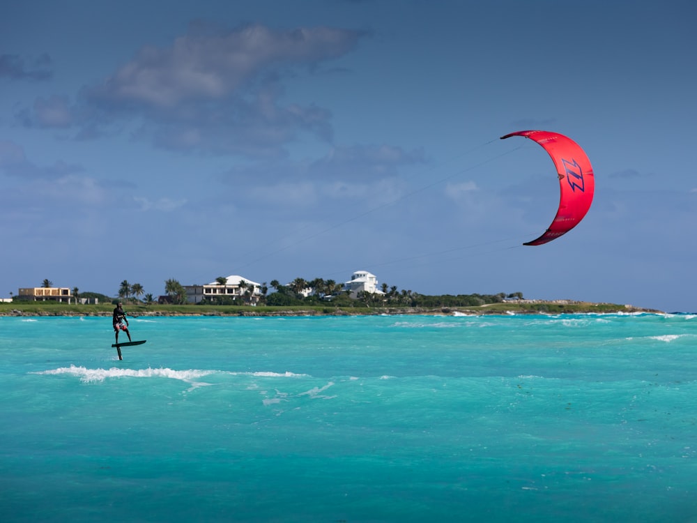 a person on a surfboard in the water