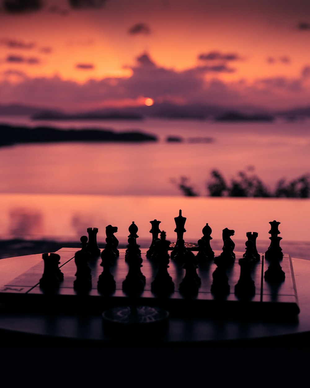 a chess board sitting on top of a table