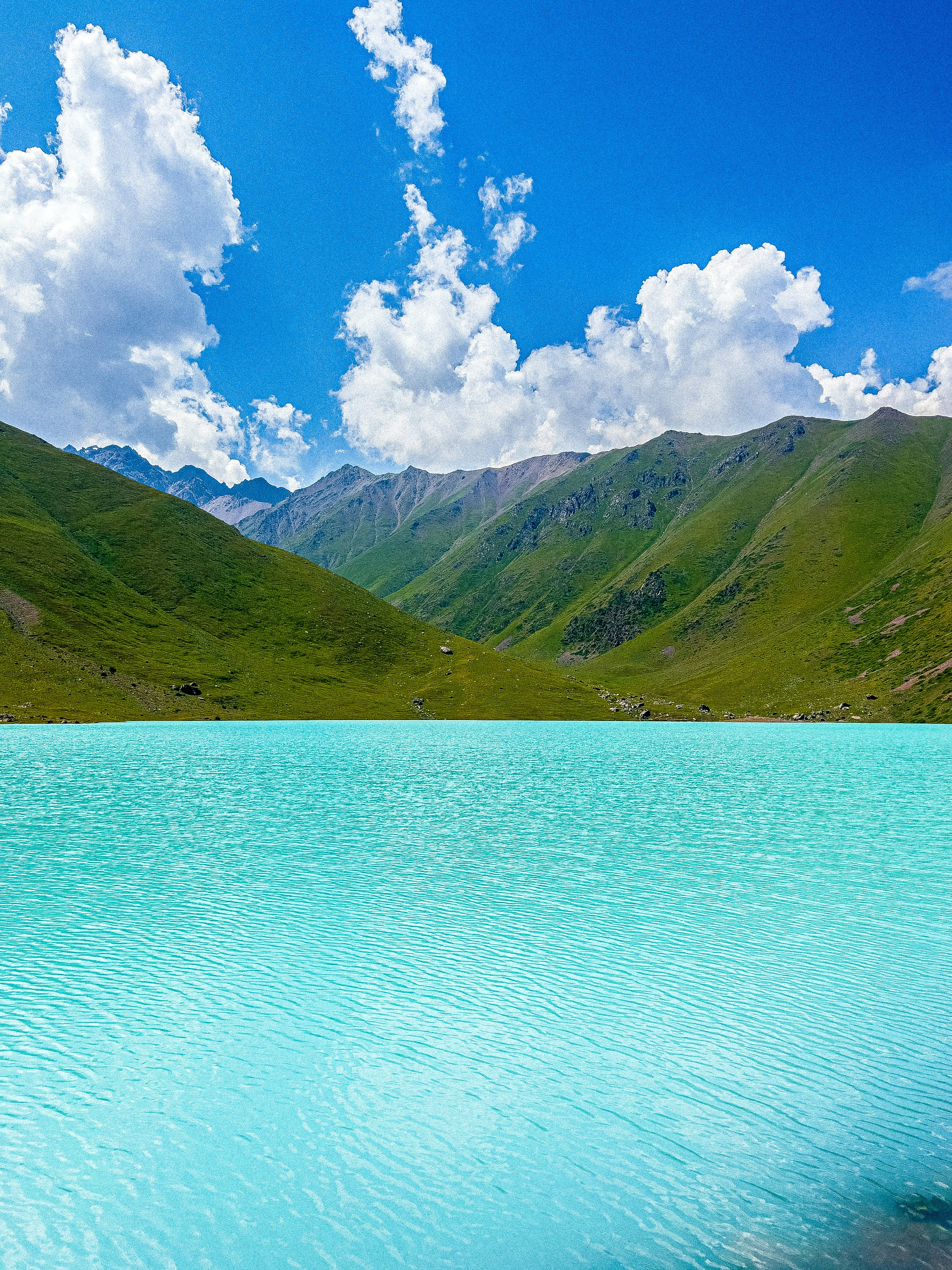 a large body of water surrounded by mountains