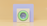 A minimalist composition featuring geometric shapes with a pastel color palette. In the foreground is a square structure with a circular, green-bordered element resembling a speaker or lens. The backdrop consists of a soft purple rectangle set against a warm beige background.