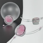 A neat arrangement of littlefrog clothing pieces showcasing soft ivory and antique gold accents.