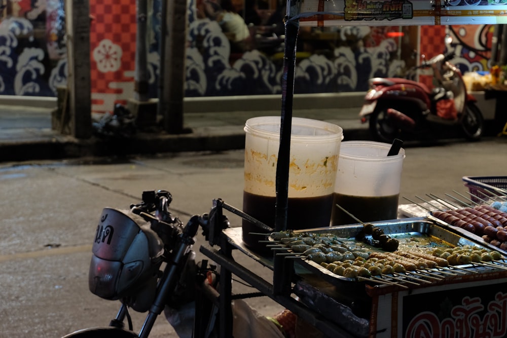 a street vendor selling food on the side of the road