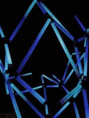 Abstract visualization of interconnected automated workflows glowing in futuristic blue.