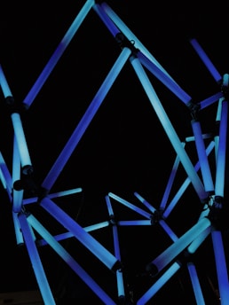 Abstract visualization of interconnected automated workflows glowing in futuristic blue.