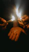 Hands carefully pouring wax into a candle mold in a bright, inviting workshop.