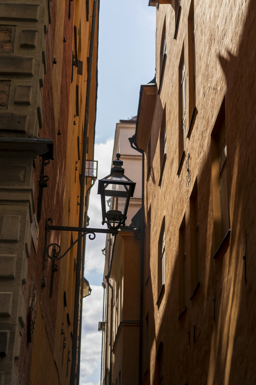 a street light hanging off the side of a building