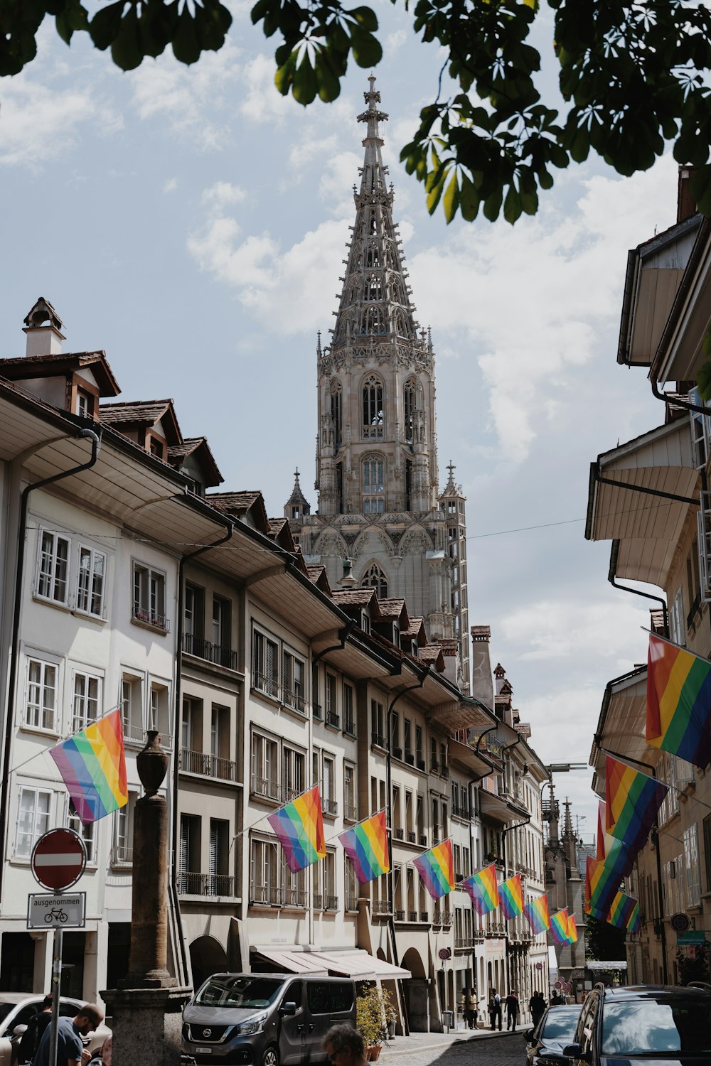 a large cathedral towering over a city filled with tall buildings