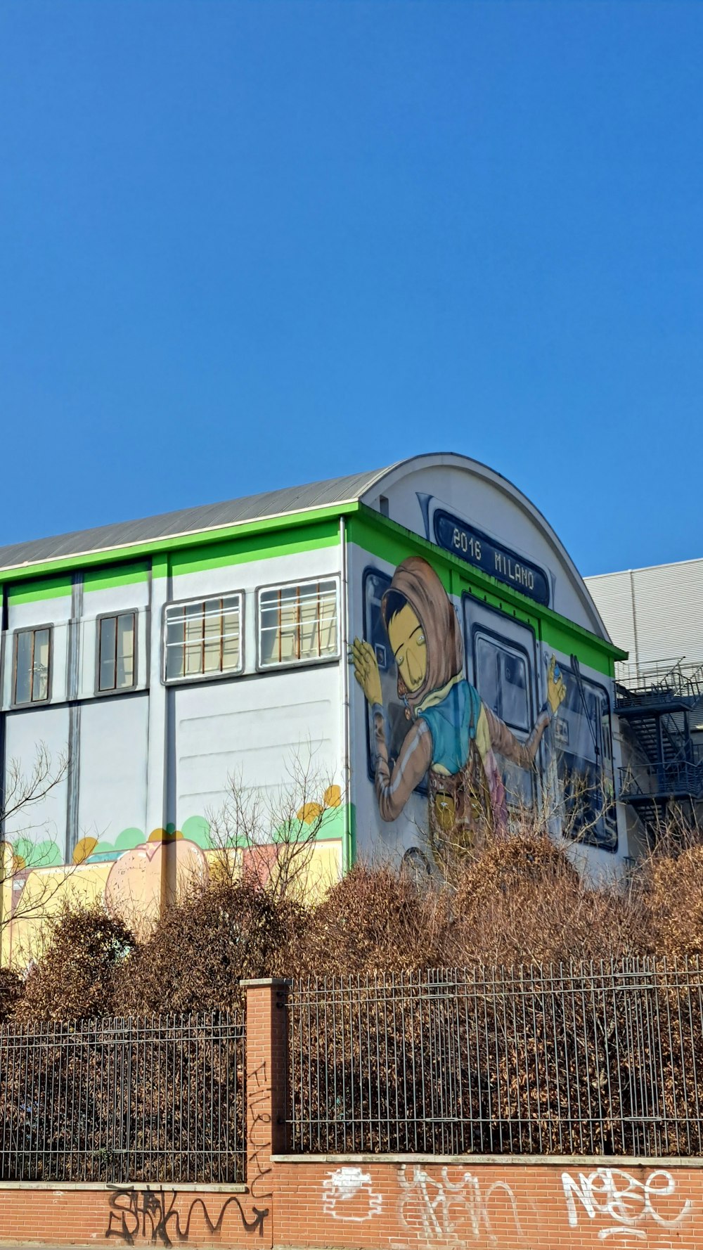 a building with a mural on the side of it