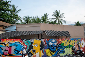 A vibrant mural of a classic TV character painted on an East London brick wall.