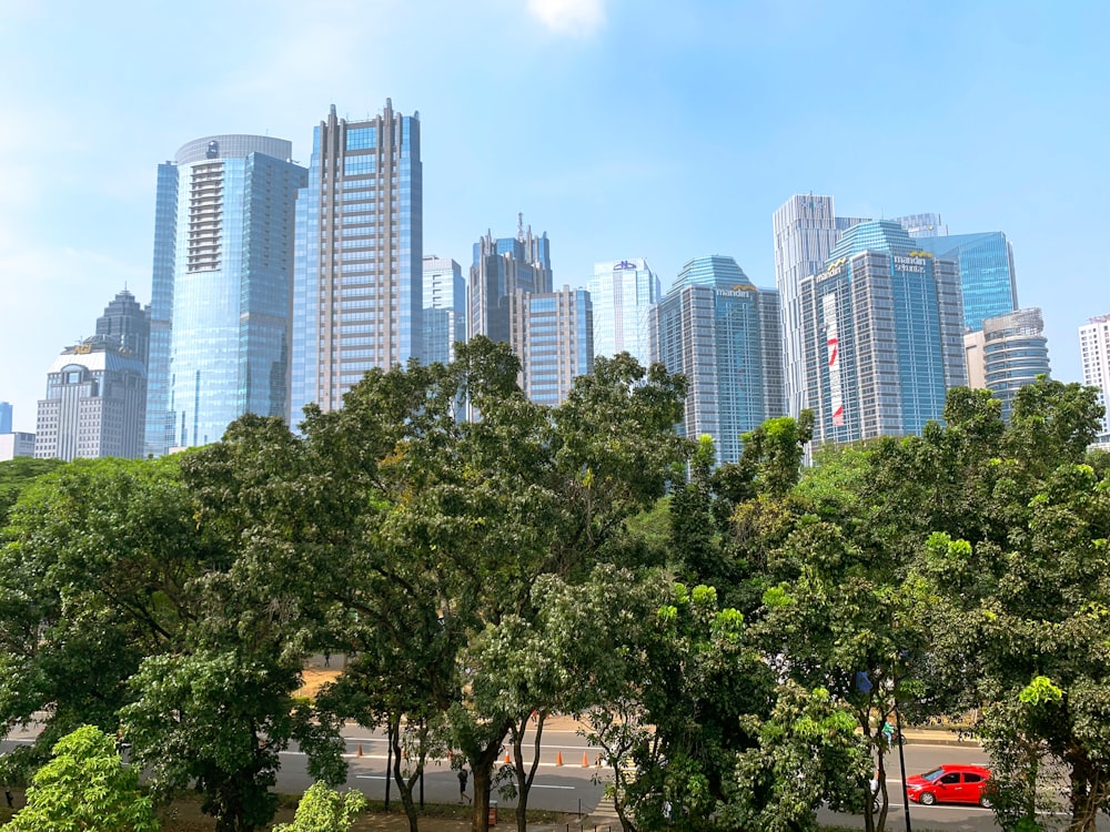 a view of a city with tall buildings in the background