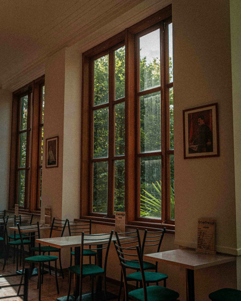 a row of tables and chairs in a room