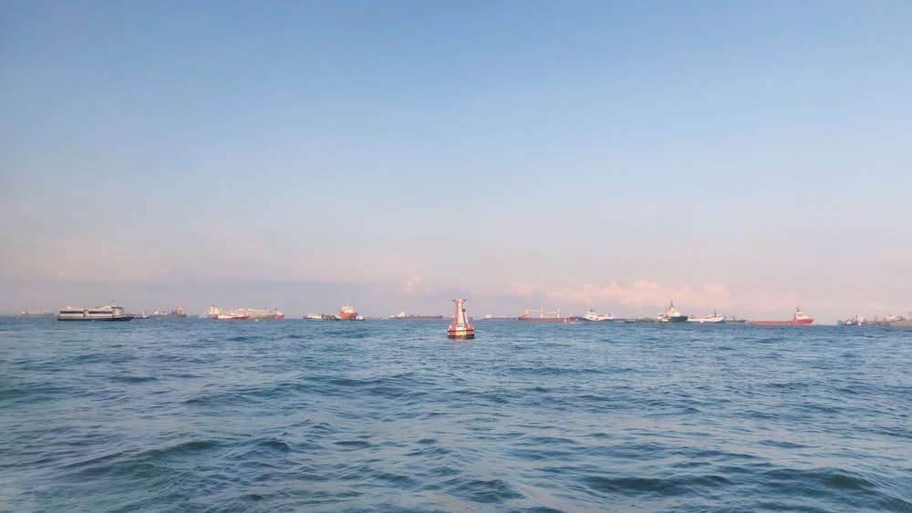 a body of water with boats in the distance