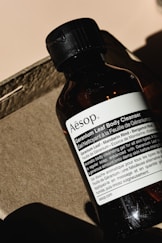 a bottle of aesop sitting on top of a counter