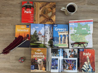 A colorful collage of travel guide covers featuring beaches, mountains, and cityscapes.