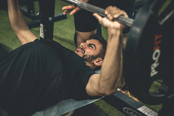 How to Bench Press with Proper Form (And Finally Break Through Plateaus)