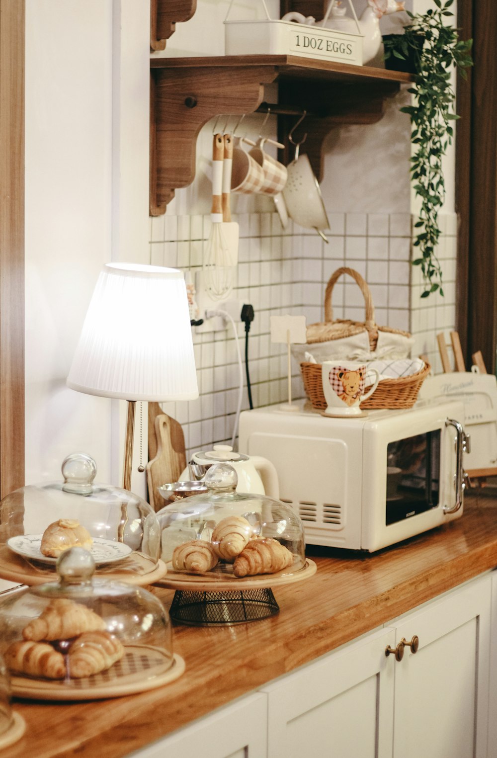 a kitchen counter topped with a microwave and a toaster oven