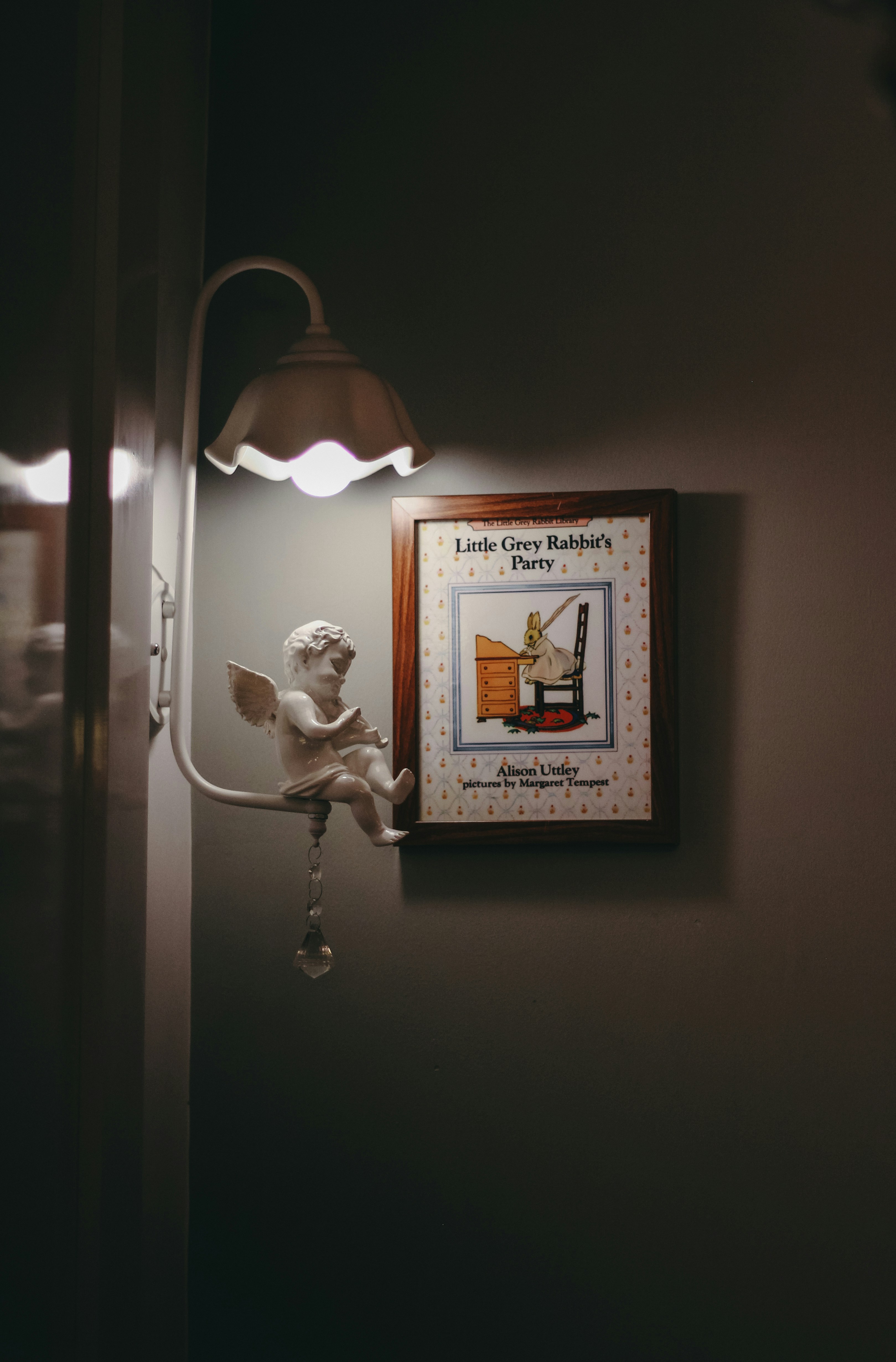 a picture hanging on the wall of a bathroom