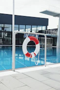SafeSwim project logo on navy blue background with EU co-funded emblem